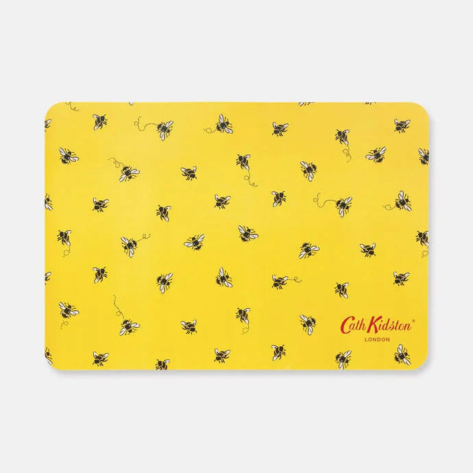 Yellow feeding mat with bee pattern and 'Cath Kidston' branding on a white background