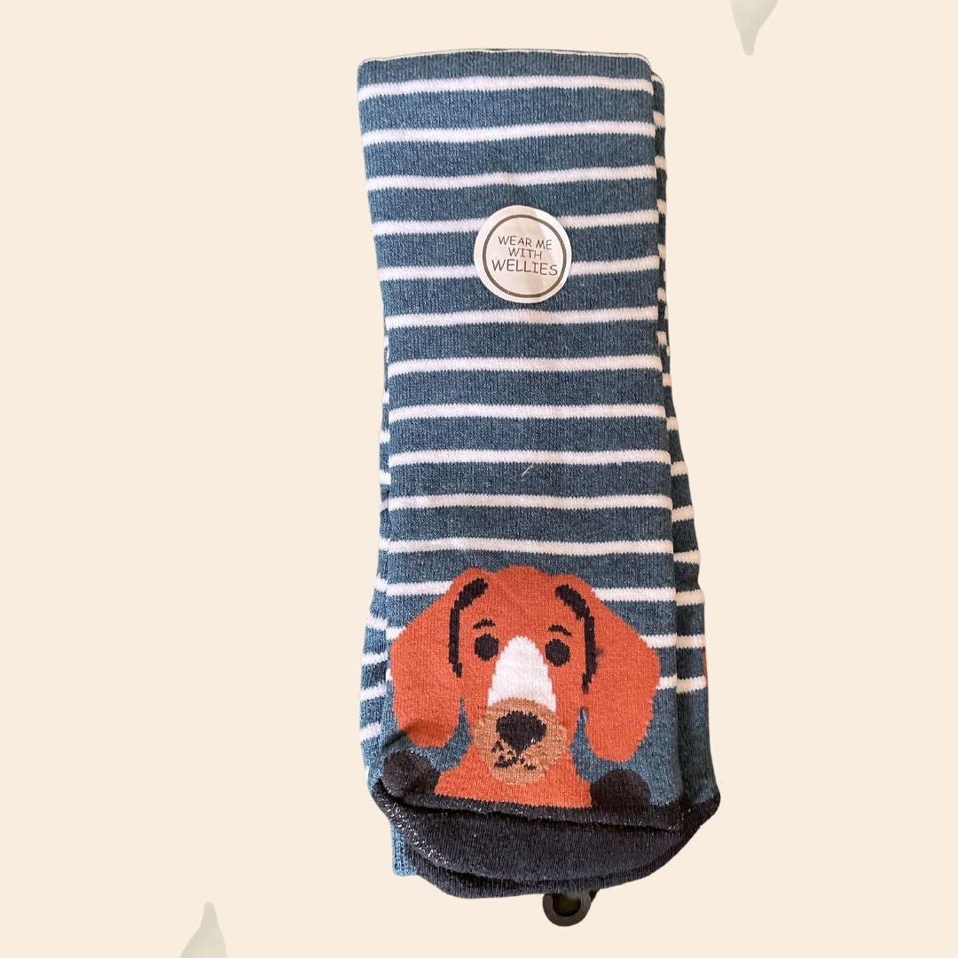 Striped sock with a dog design on a beige background