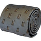 A rolled-up gray silk necktie featuring an all-over repeating pattern of small brown and black French Bulldog illustrations, shown against a plain white background.