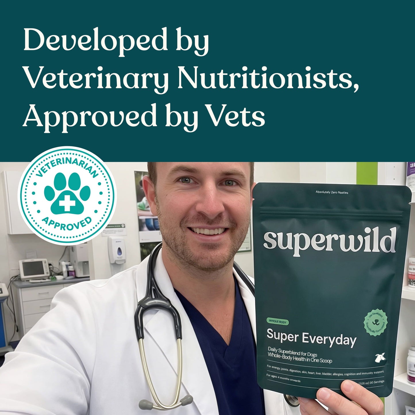 A veterinarian in a white lab coat holds a pouch of superwild Super Everyday dog supplement in a clinic setting. The top of the image features a teal banner with the text 'Developed by Veterinary Nutritionists, Approved by Vets' and a circular 'Veterinary Approved' badge.