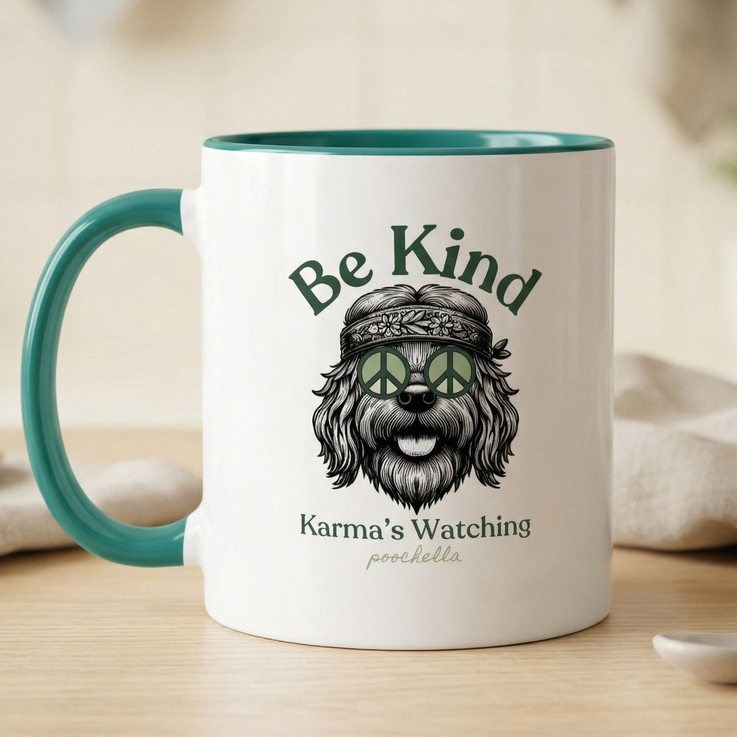 Mug with 'Be Kind Karma's Watching' design on a wooden surface