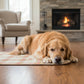 dog laying Plaid blanket with a contrasting inner layer on a white background