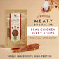 Elkwood Meaty Dog Treats package with chicken jerky strips on a beige background