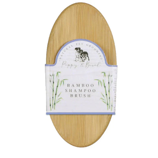 Bamboo shampoo brush with a label on a white background