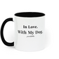 White mug with black interior and handle, featuring 'In Love. With My Dog.' text on a white background.