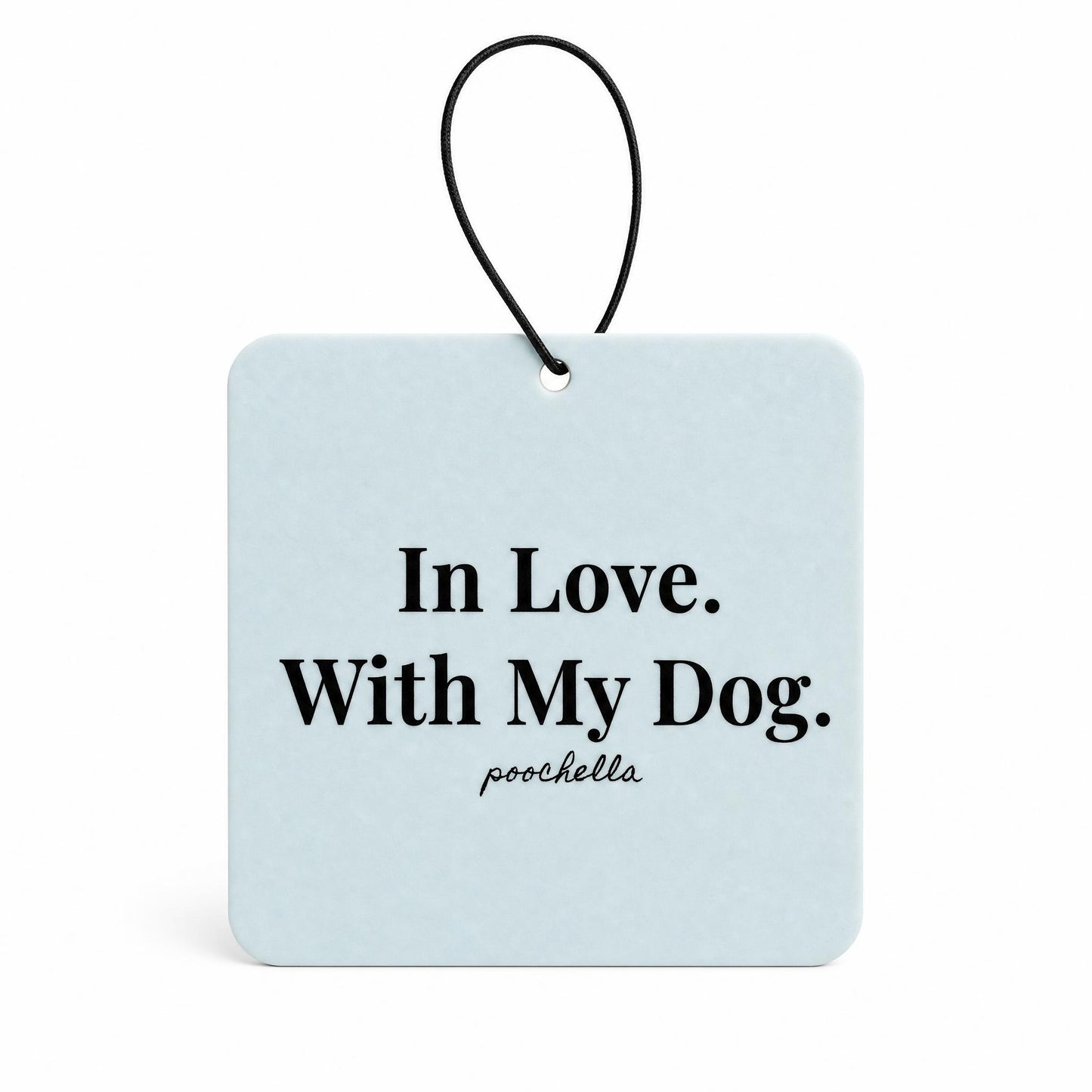 Light blue hanging sign with 'In Love. With My Dog.' text on a white background