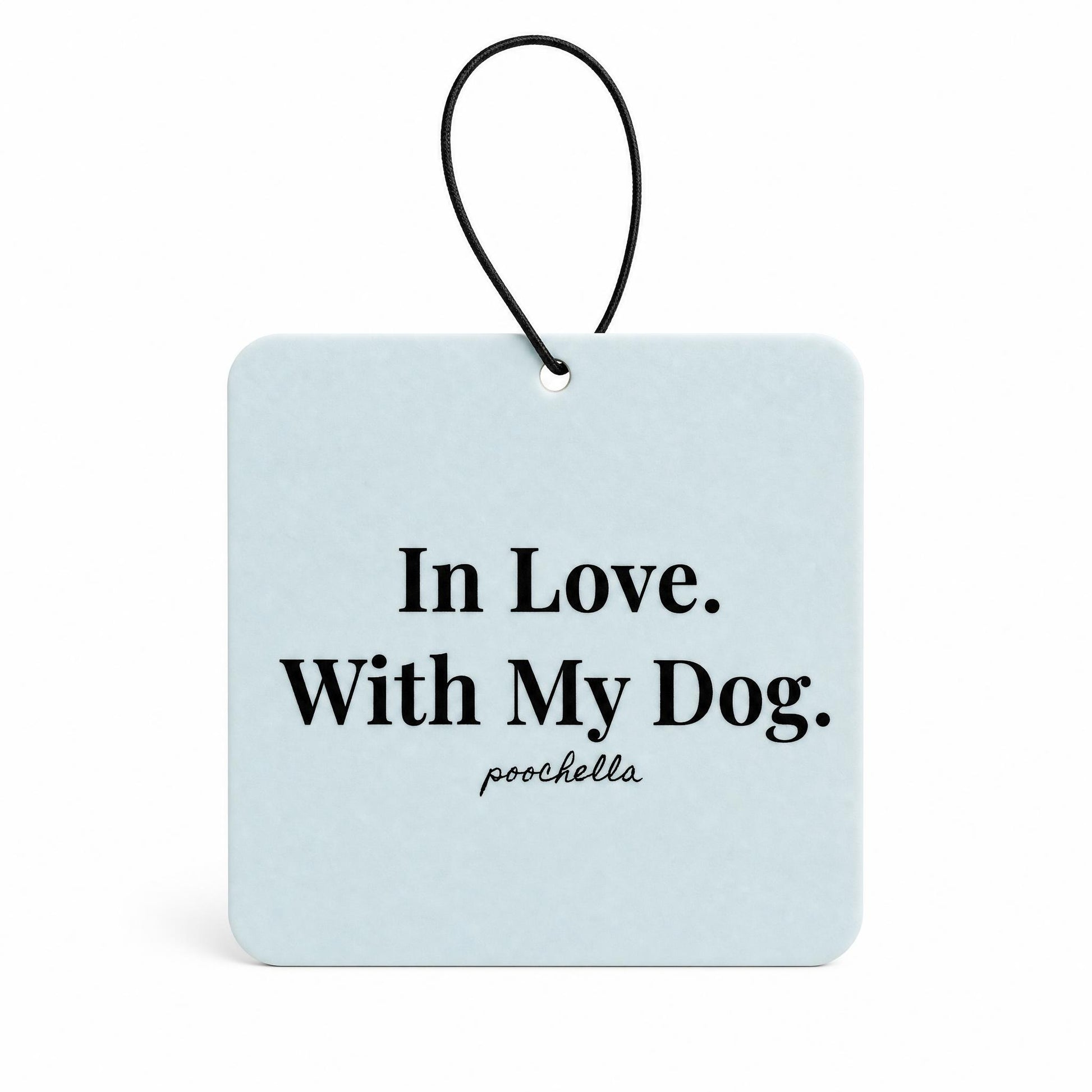 Light blue hanging sign with 'In Love. With My Dog.' text on a white background
