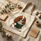 Tote bag with a dog reading a book illustration on a textured surface with cotton and twine.