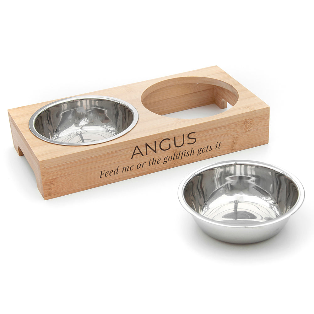 Pet bowl set with wooden stand and engraved text on a white background