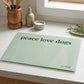 peace love dogs glass chopping board in kitchen
