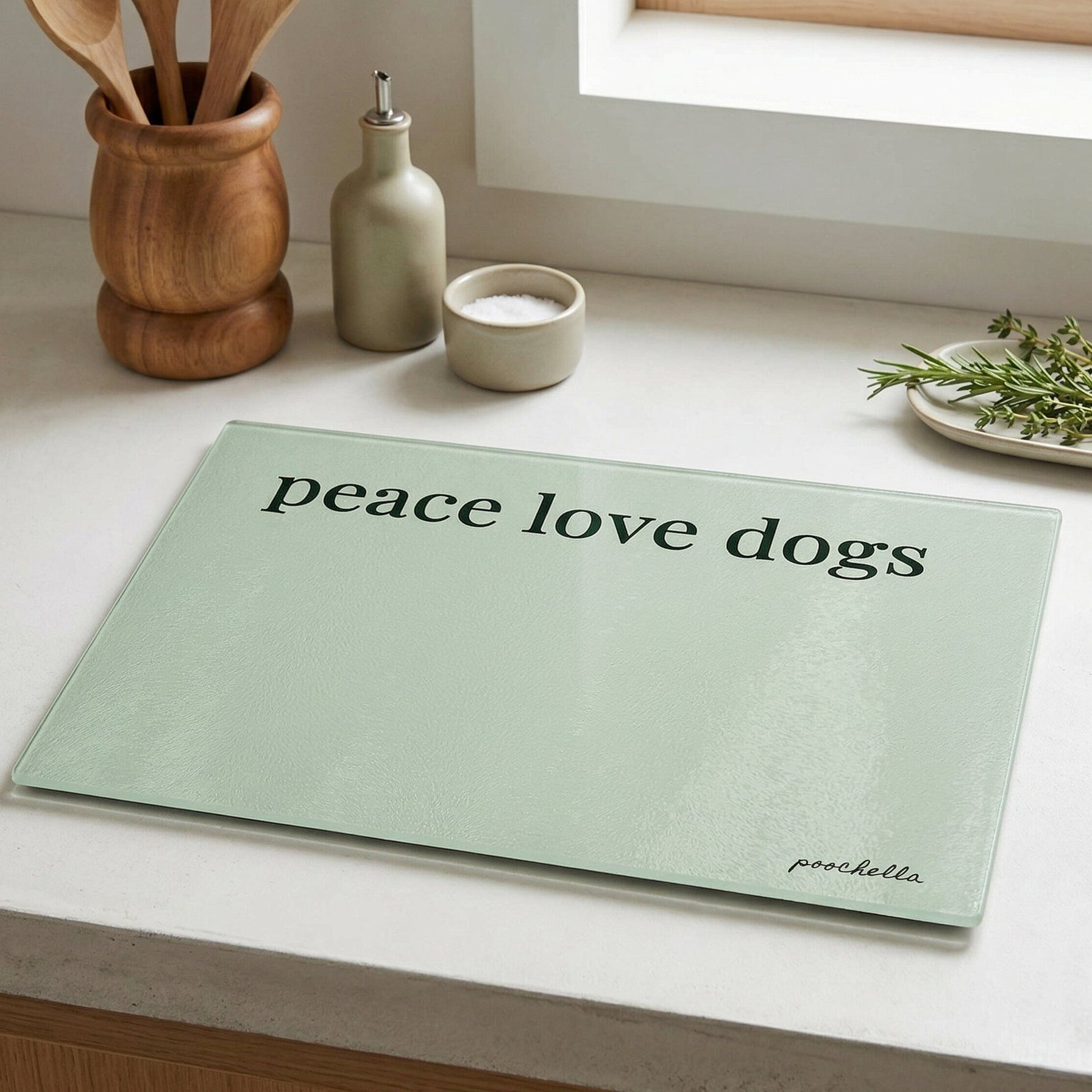peace love dogs glass chopping board in kitchen