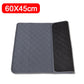 Gray quilted puppy pad dog training mat with black border on a white background, size 60x45cm indicated.