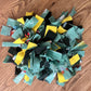 Colorful fabric snuffle mat for dogs on a wooden floor