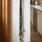 check dog lead hanging by the back door