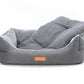 Gray pet bed with a visible brand logo on a white background