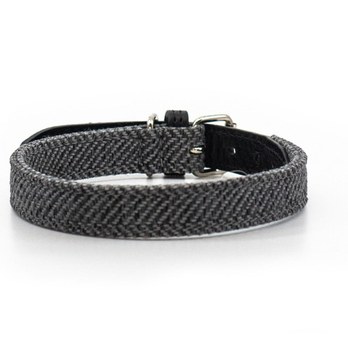 Black and grey herringbone tweed dog lead on a white background
