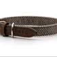 Brown woven dog collar with leather buckle on a white background