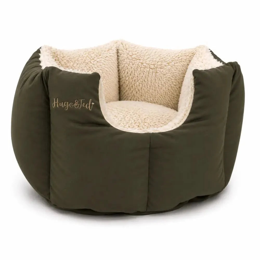 Brown pet bed with beige interior on a white background
