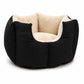 A black pet bed with a plush cream sherpa lining, photographed on a clean white background. A faint 'Huge & Ted' brand watermark is visible on the left side of the bed.