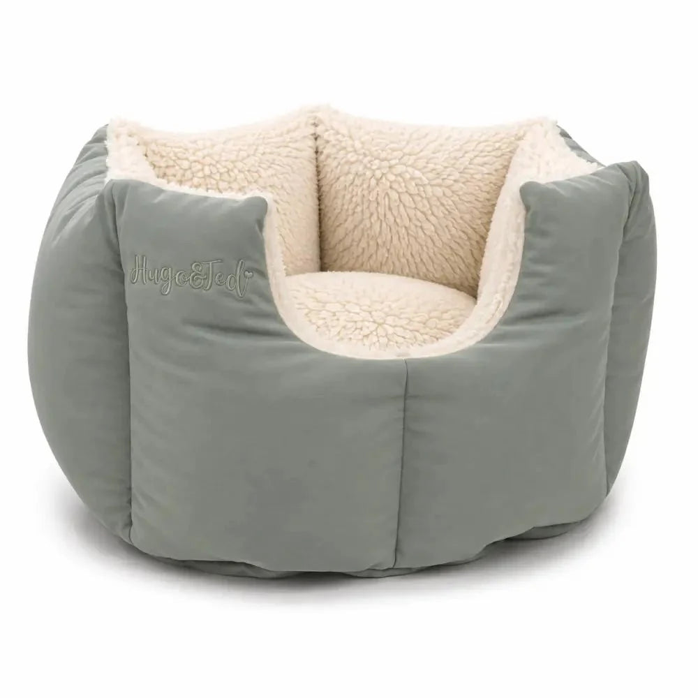 Gray pet bed with beige interior on a white background