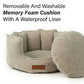 Beige pet bed with round cushion and text about removable and washable memory foam cushion with waterproof liner.