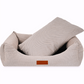 Beige pet bed with a pillow on a white background