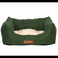 Green pet bed with a fluffy cushion on a white background