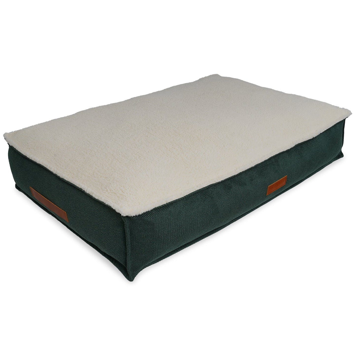Dog bed with green exterior and beige interior on a white background