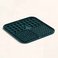 Green rubber mat with textured surface on a white background