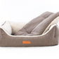 Pet bed with a brown exterior and white interior on a white background