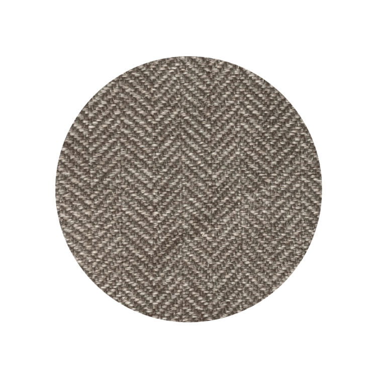 Round fabric swatch with a herringbone pattern on a white background