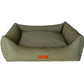 Green pet bed with a visible brand logo on a white background