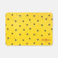 Yellow feeding mat with bee pattern and 'Cath Kidston' branding on a white background