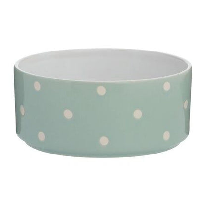 ceramic polka dot pet bowl on white background