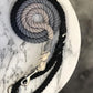 black grey rope lead